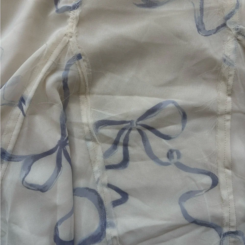 white minidress with purple bows - Picture 4 of 4